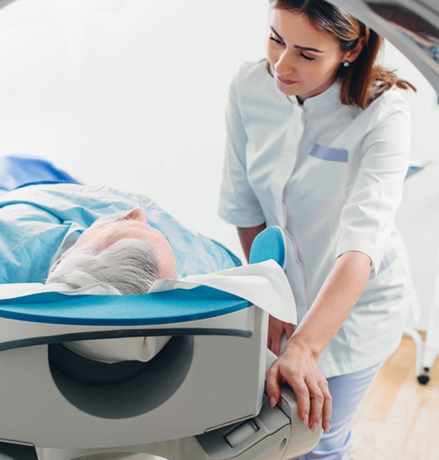 Female-doctor-speaking-to-a-patient-before-CT-scan-and-discussing-calypso-fiducial-seed-placement-procedure